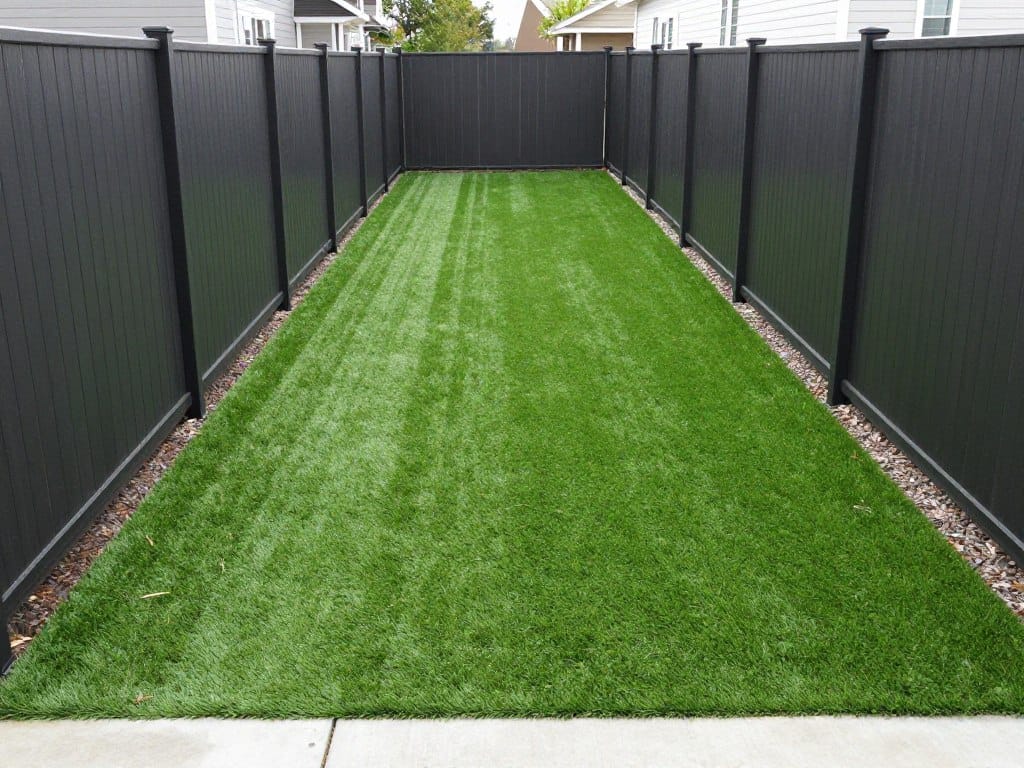 Side yard turf installation solving drainage issues in Dyer Side yard turf installation solving drainage issues in Dyer